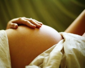 The pregnant woman on the ninth month. The child will be born one of these days